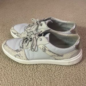 White, grey, silver, and snake skin Cole Haan sneakers. Size 11